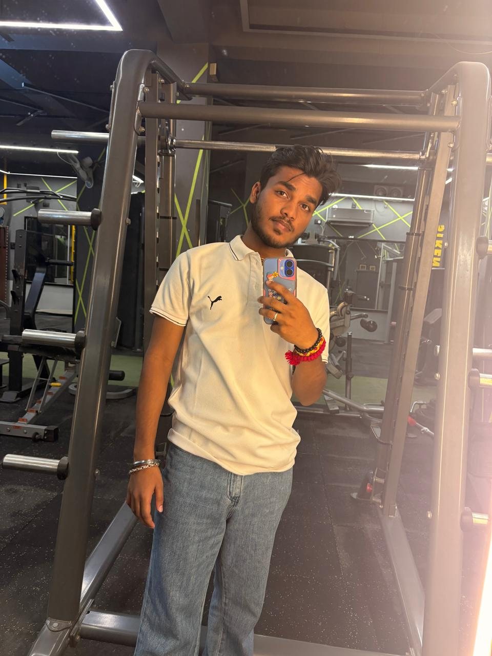 Ayush Gupta in a gym mirror photograph
